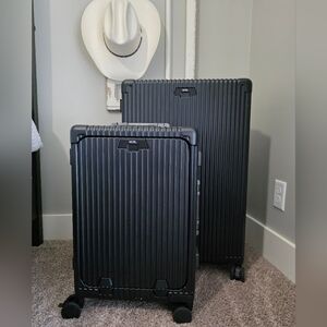 Nobl Black Suitcase Set And Creme Suitcase Set